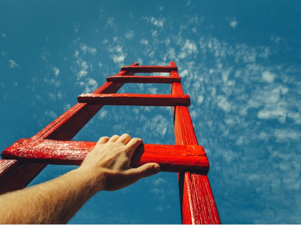 Person climbing a ladder into the sky